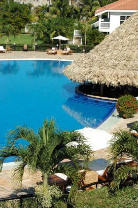 The garden around the swim- up pool bar The Placentia, Placencia, Belize – Best Places In The World To Retire – International Living